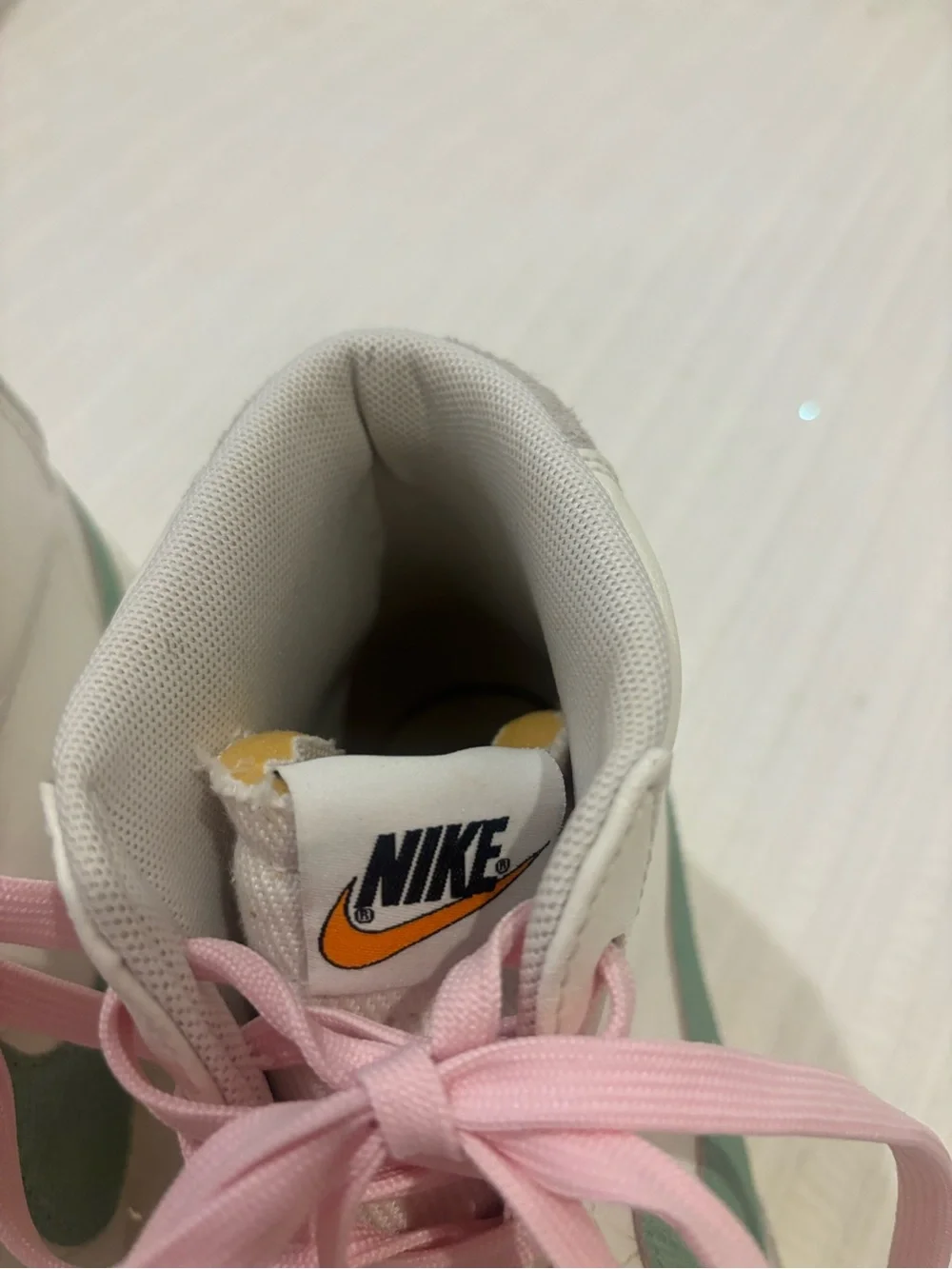 Nike Women’s White High-Top Lace-Up Boots with Pink Laces and Green Swoosh